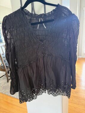 Eyelet bottom Black blouse by Anthropologie